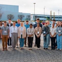 students outside the Almac premises